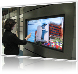 woman using interactive touchscreen kiosk